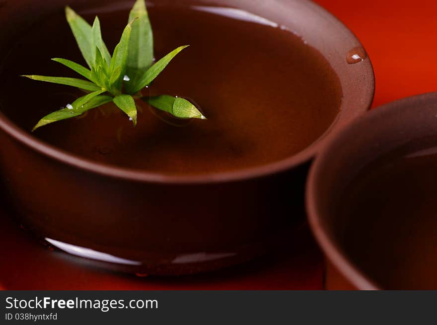 Chinese teacups and fresh tea