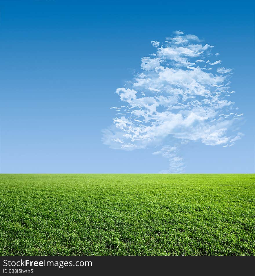 Cloud in a tree on a green meadow