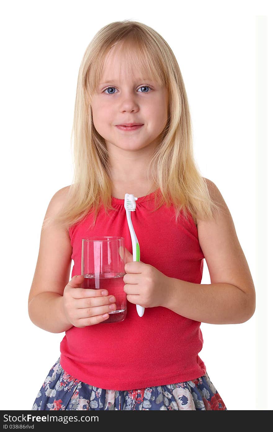 Portrait of a cute little girl brushing teeth