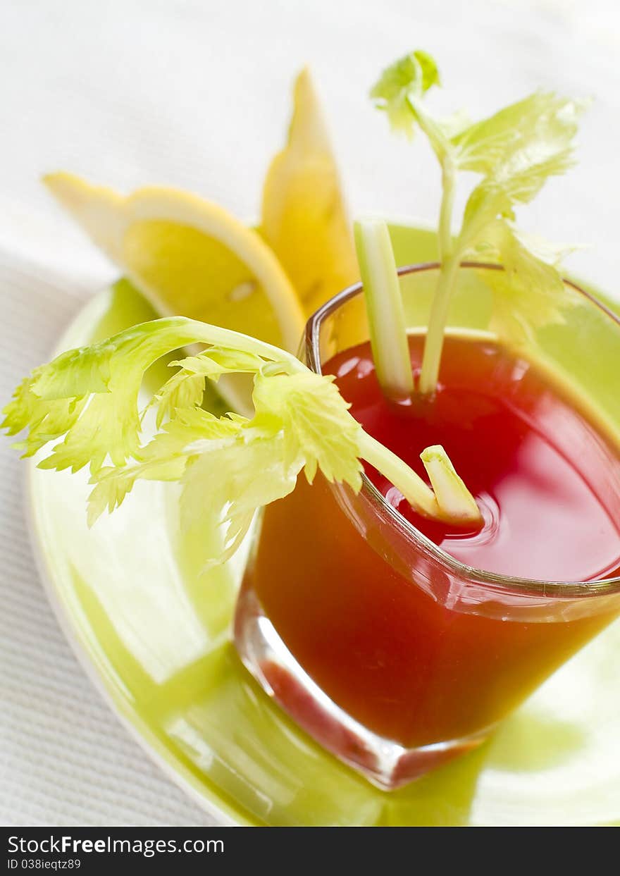 Fresh tomato juice or Bloody Mary with celery