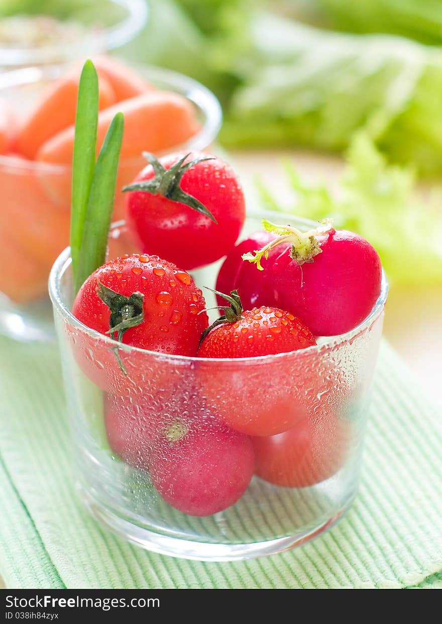 Fresh ripe vegetable in glasses on table. Fresh ripe vegetable in glasses on table