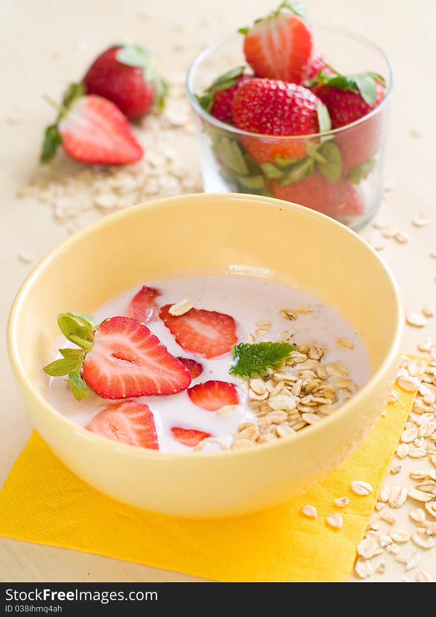 Breakfast yogurt with oatmeal and strawberry