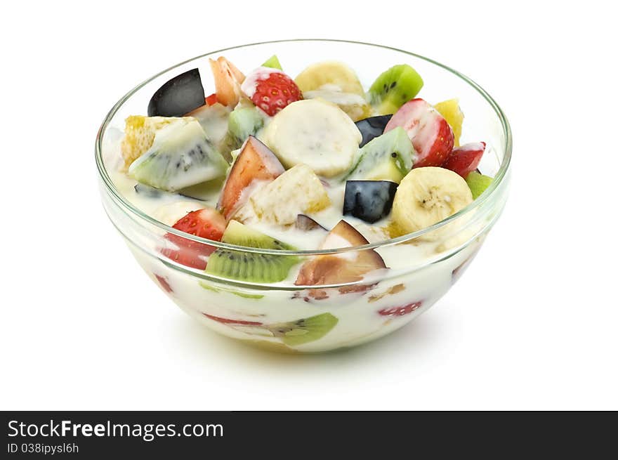 Fruit salad isolated on white