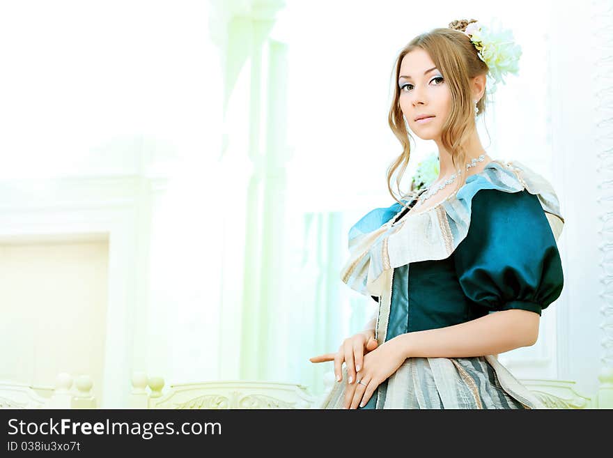 Portrait of a beautiful woman in medieval era dress. Portrait of a beautiful woman in medieval era dress.