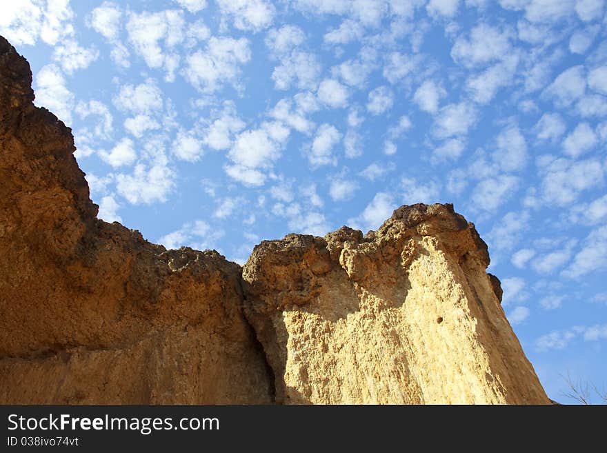 Rock formations place, Phae Muang Phi in the small cloud blue sky