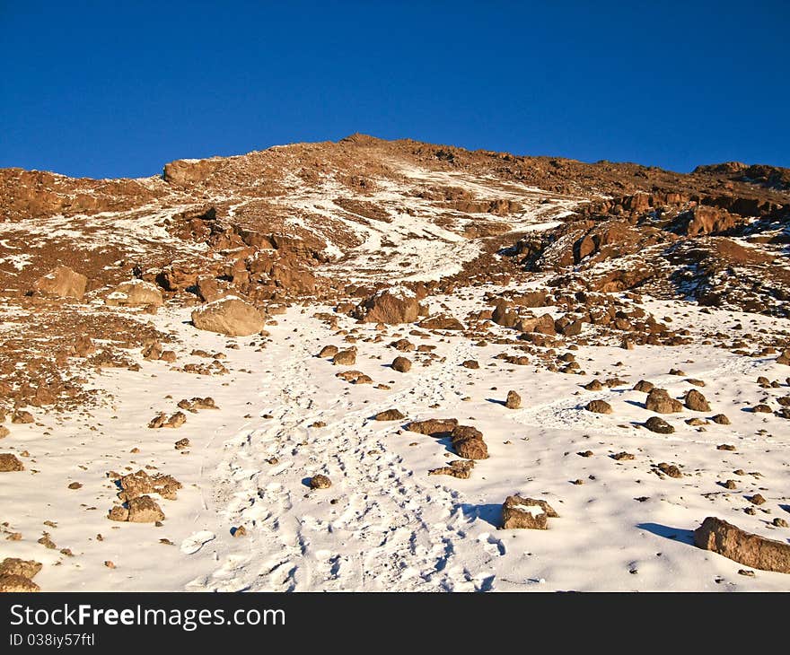 Mount Kilimanjaro, the highest mountain in Africa in snow. Mount Kilimanjaro, the highest mountain in Africa in snow