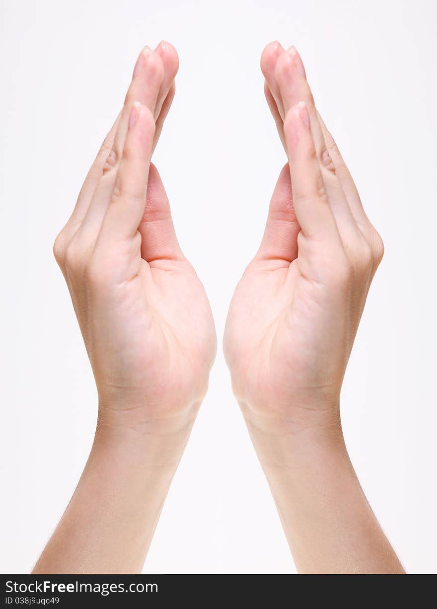 Woman hands over white background. Isolated image