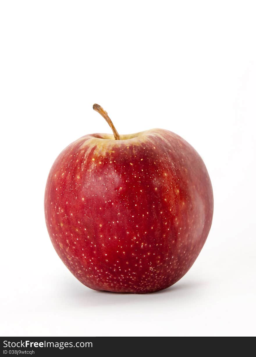 Red apple over white background. Isolated fruit