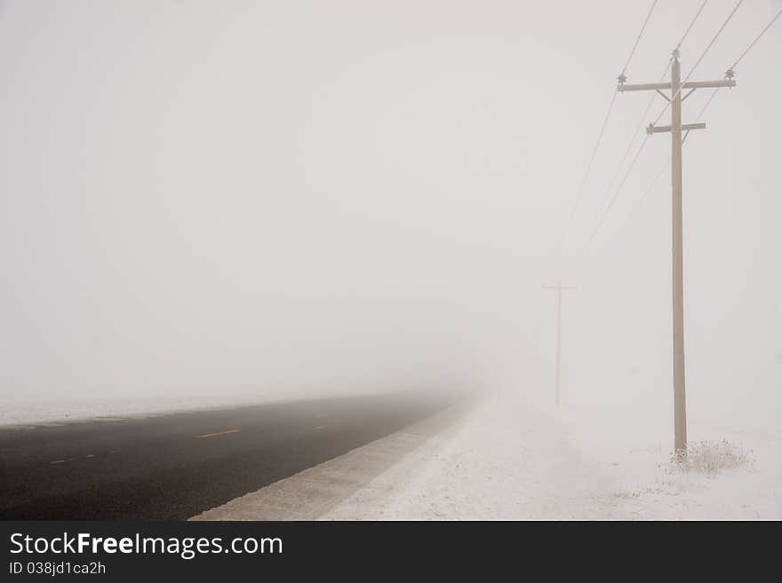 Snowbound Telephone Pole Rural Road