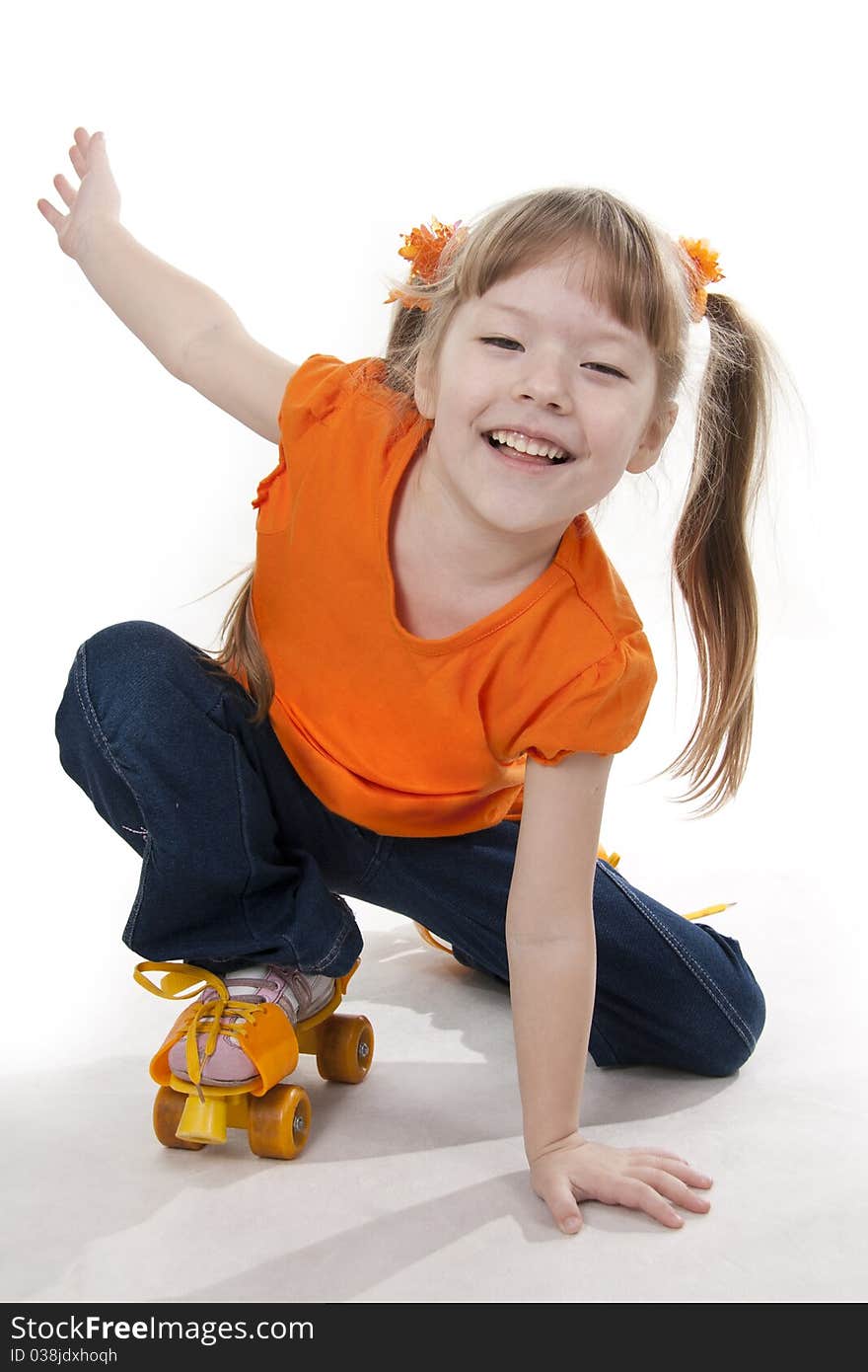 The little girl on roller skates. Isolated white