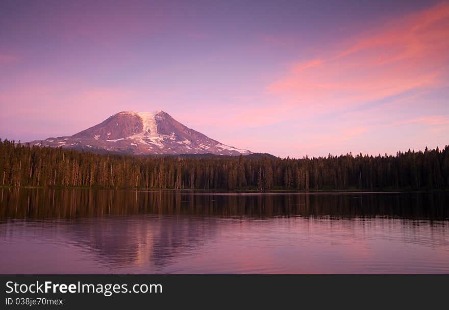 Mount adams reflected in a mountain lake at sunset. Mount adams reflected in a mountain lake at sunset