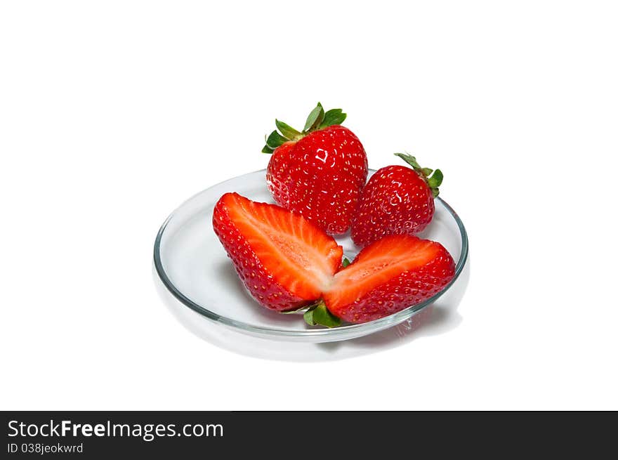 Berries red on a glass plate. Berries red on a glass plate