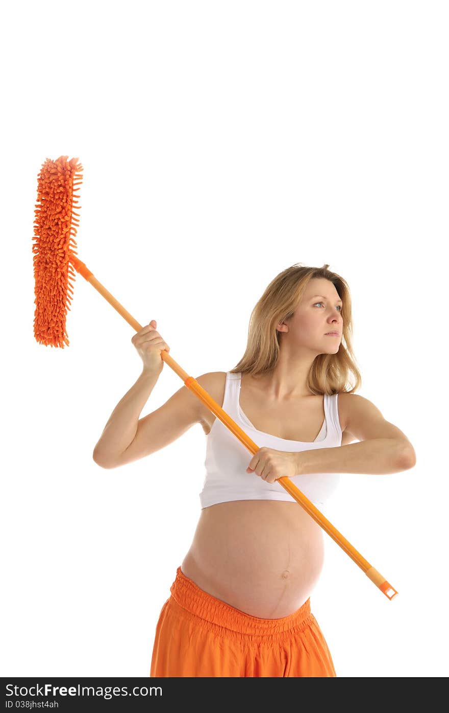 Pregnant woman with a mop isolated on white