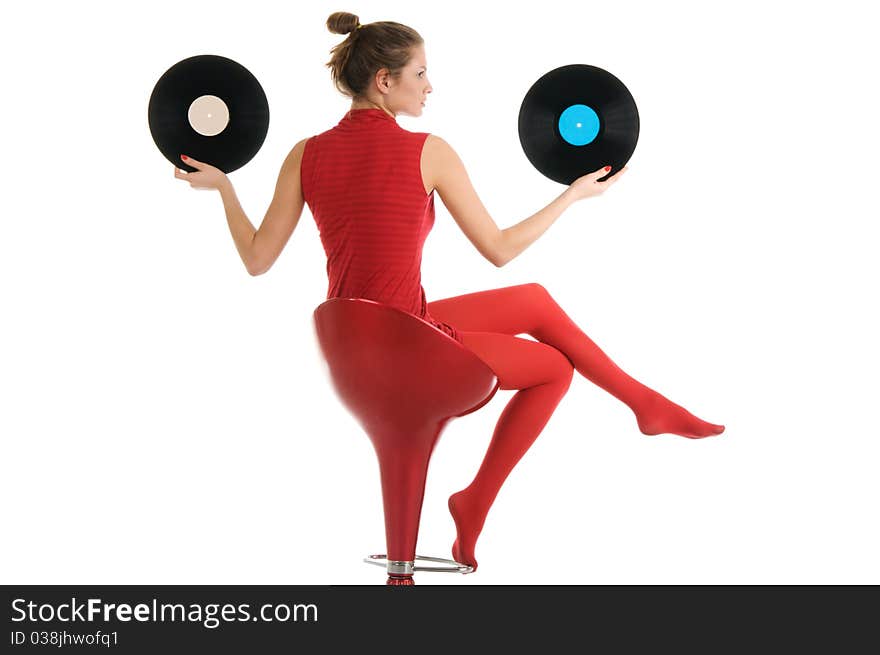 Young beautiful woman with vinyl records isolated in white