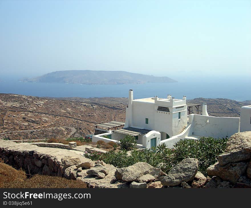 A landscape of a house on the Greek Island of Mykonos. A landscape of a house on the Greek Island of Mykonos.