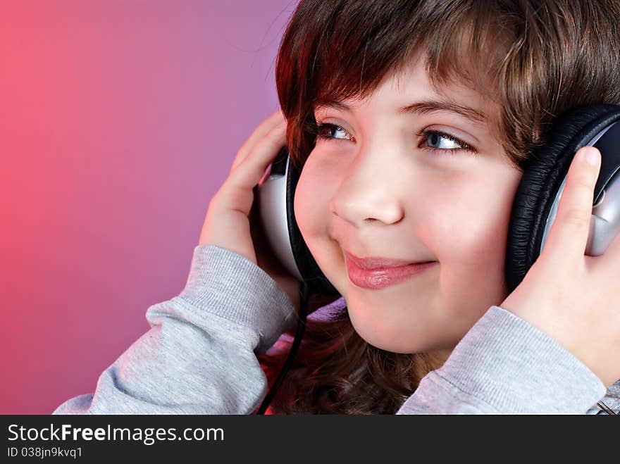 Cute little girl with earphones