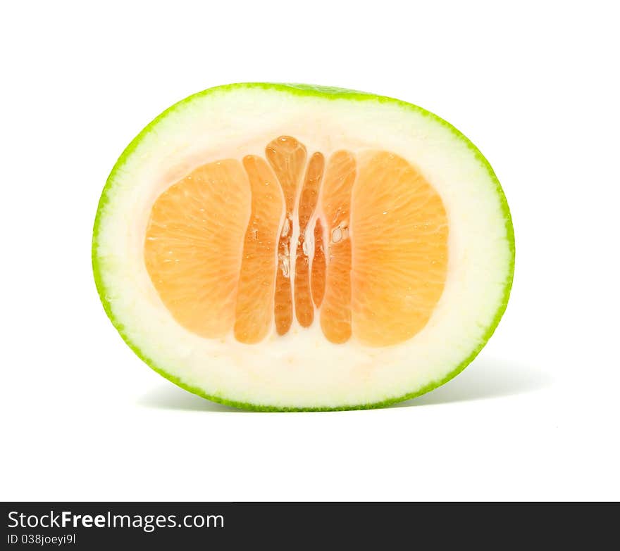 A half of green grapefruit (Jaffa sweetie) isolated on a white background. A half of green grapefruit (Jaffa sweetie) isolated on a white background