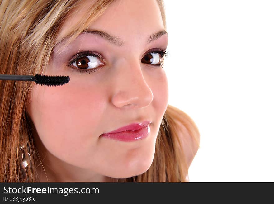 Young woman makeup with mascara eye closeup