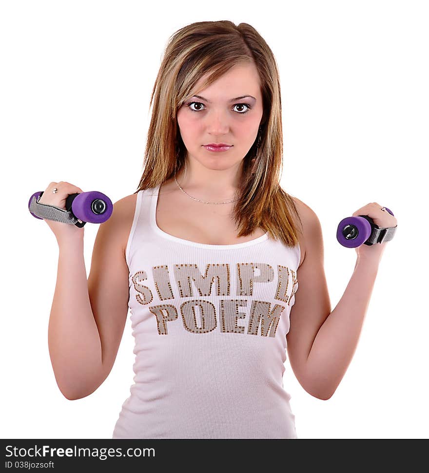 Portrait of fitness woman working out with free weights in gym