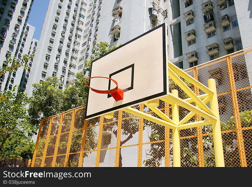 It is a very colorful basketball court in an university of Hong Kong. It is a very colorful basketball court in an university of Hong Kong.