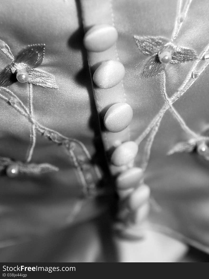 Close up details of a brides wedding dress