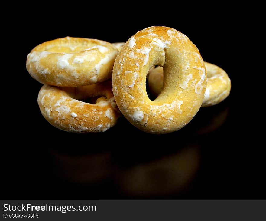 Ring bagels on a black background