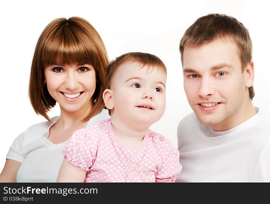 Happy family with a baby on a white background