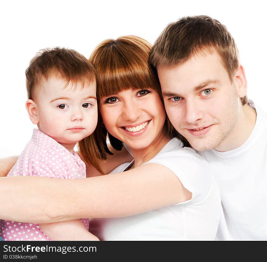 Happy family with a baby on a white background