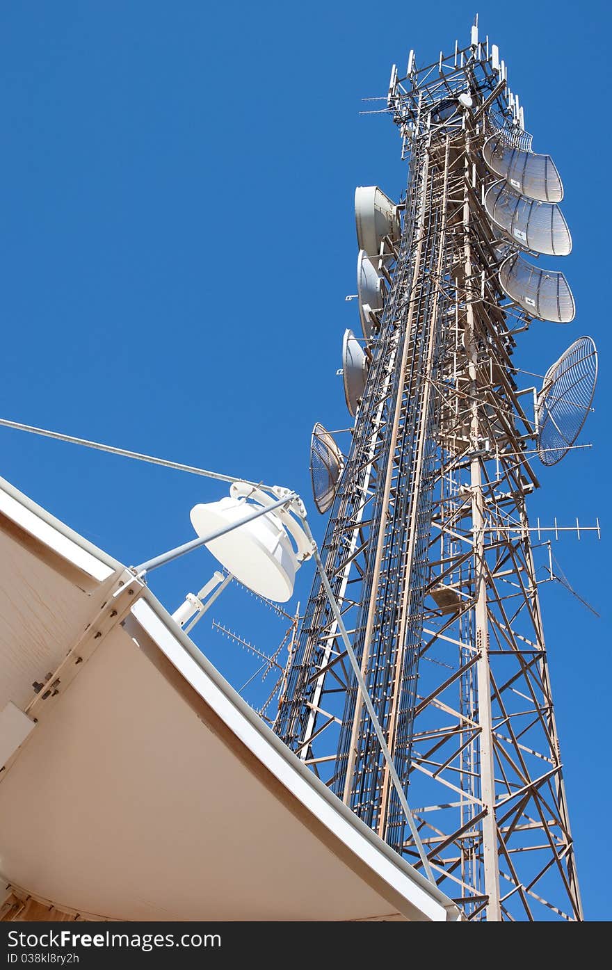 Microwave tower and satellite antenna using in telecommunication. Microwave tower and satellite antenna using in telecommunication