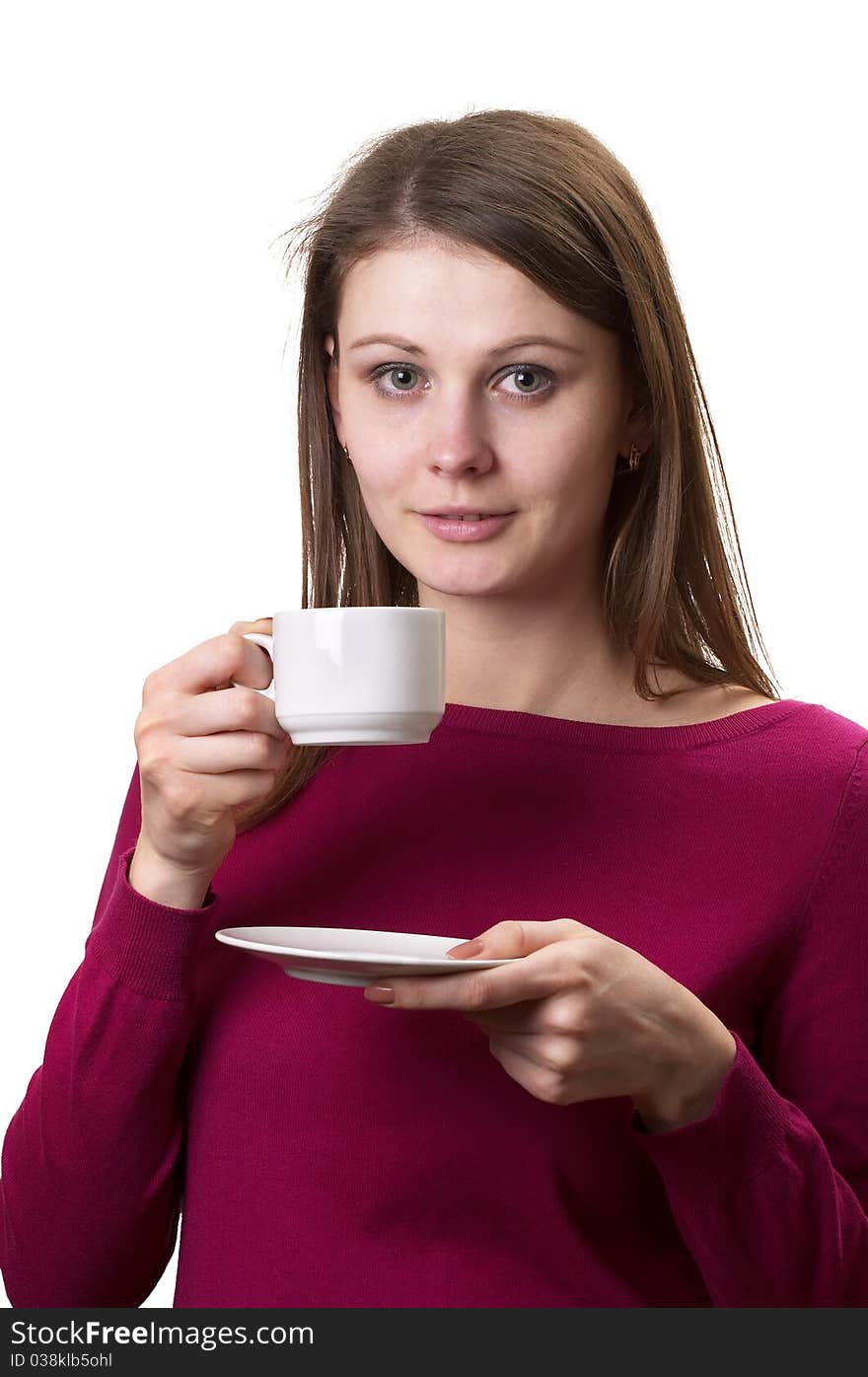 Young woman with white cup and saucer in the hands isolated over white background. Young woman with white cup and saucer in the hands isolated over white background