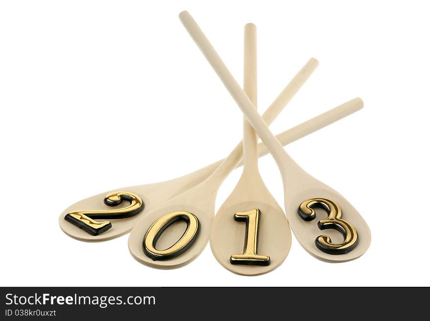 Number 2013 on spoons are isolated on a white background