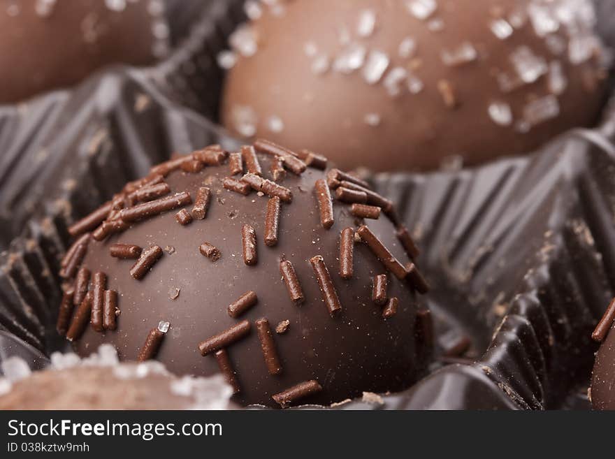 Truffle candy coated chocolate with decorative powdered for the occasion.