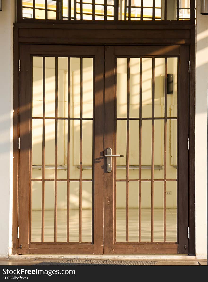 Closeup of Wood & glass arch door. Closeup of Wood & glass arch door.