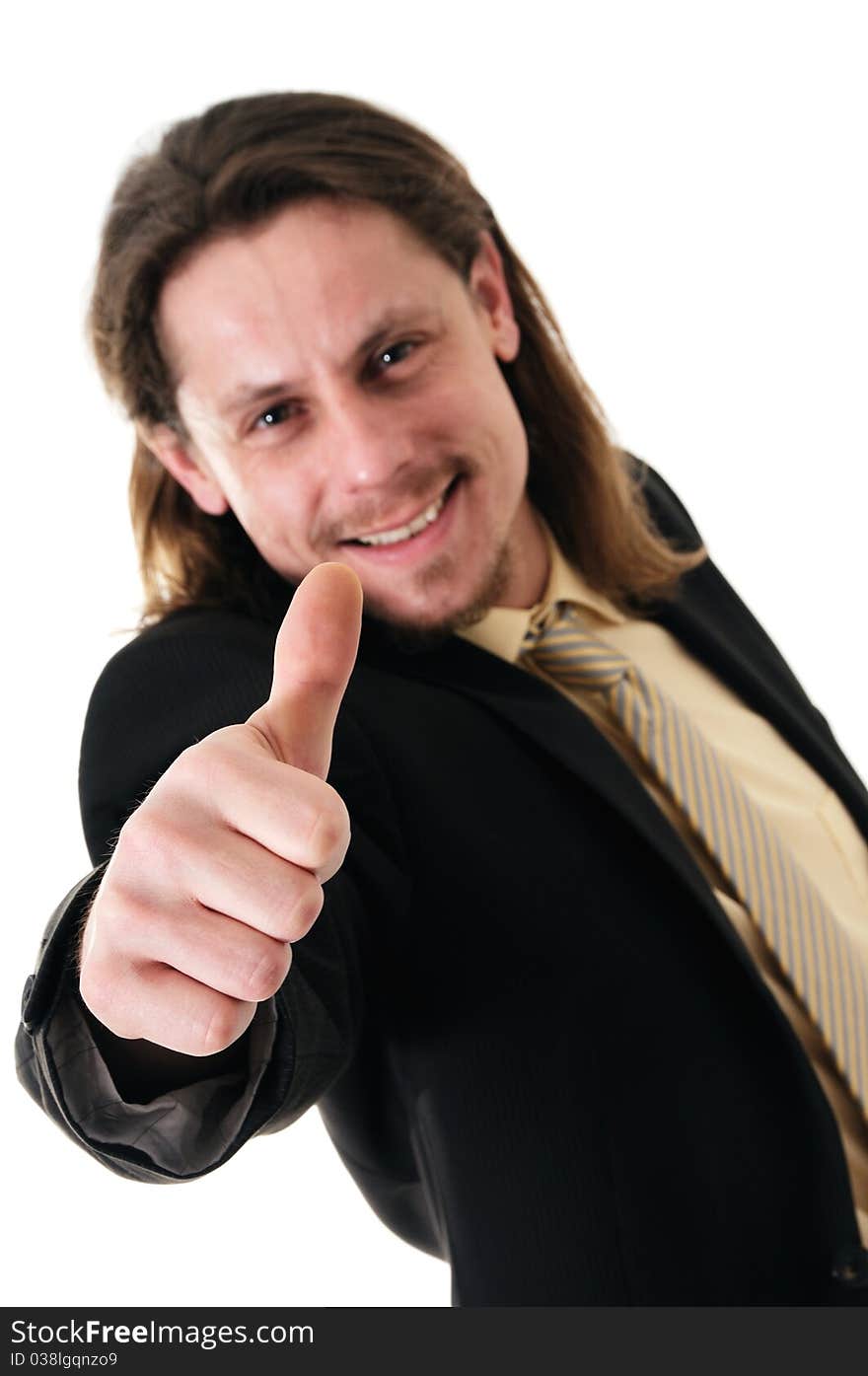 Young successful businessman with thumbs up isolated on white background.