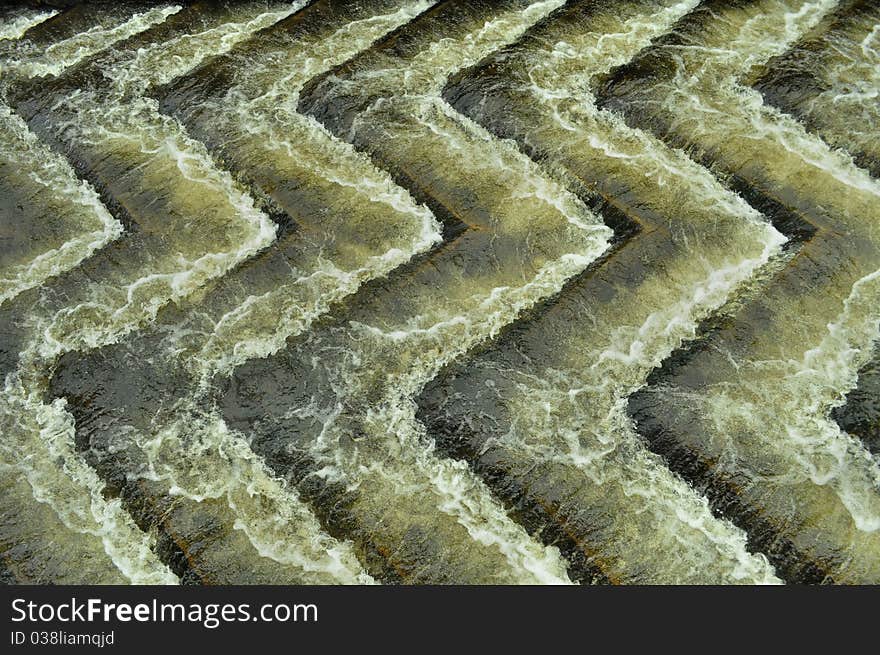 Lines of water on weir