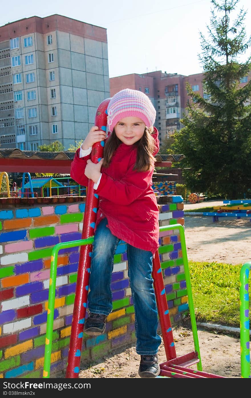 Smiling little girl at the playground