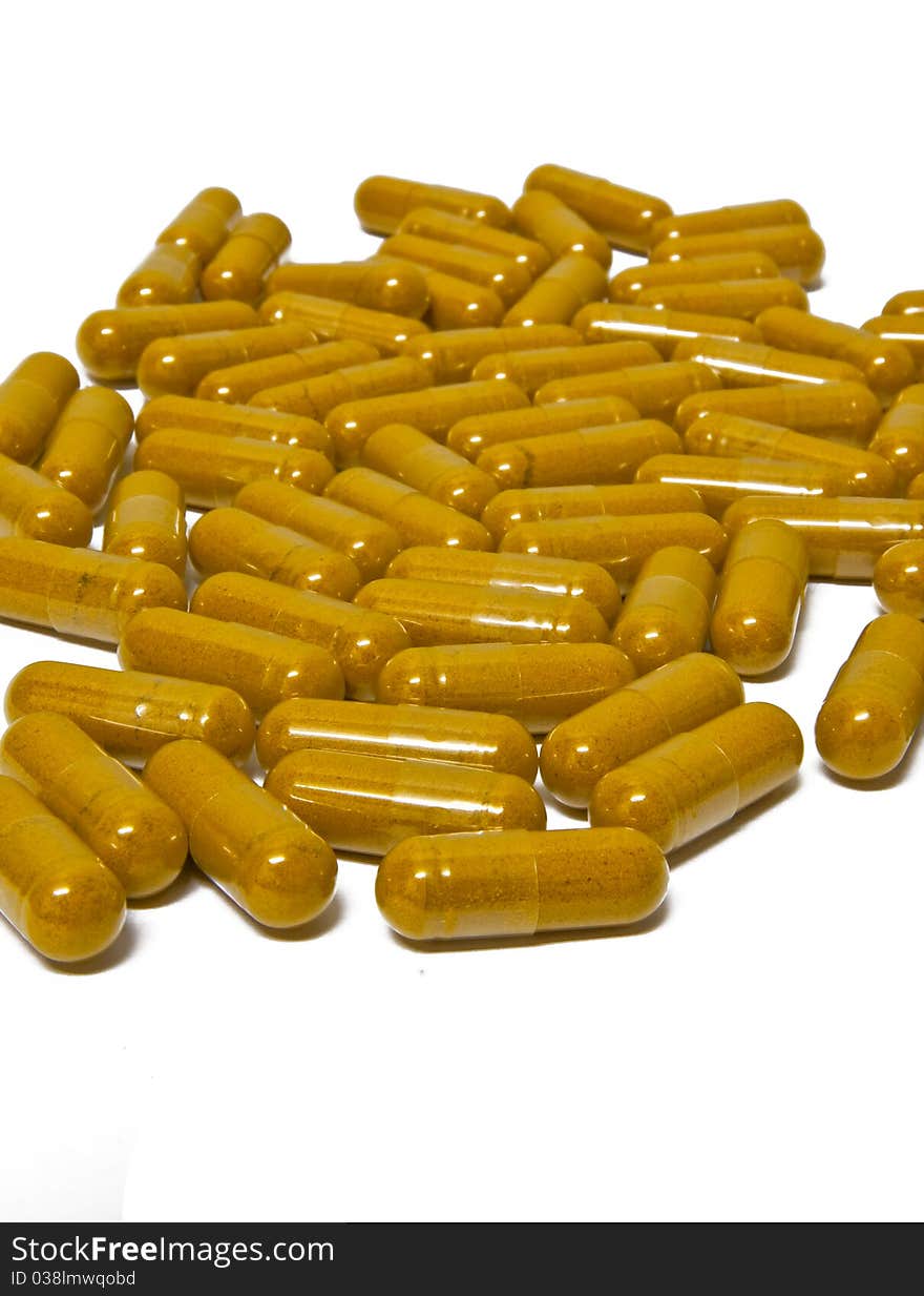 Yellow tablet isolated