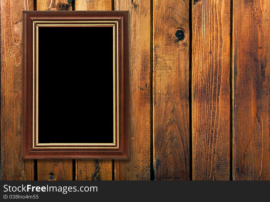 Vintage frame on wooden wall