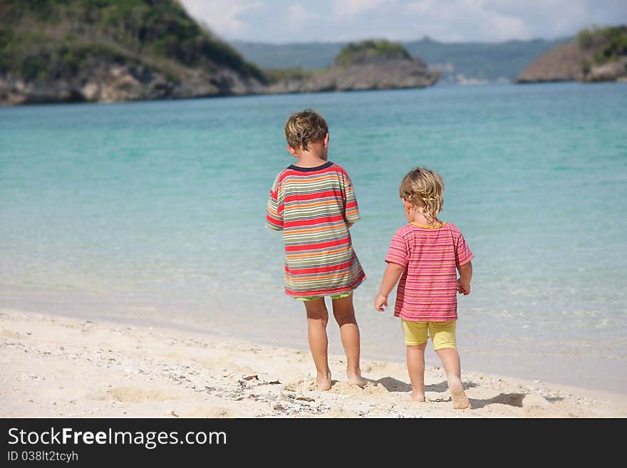 Two children playing on beach. Two children playing on beach