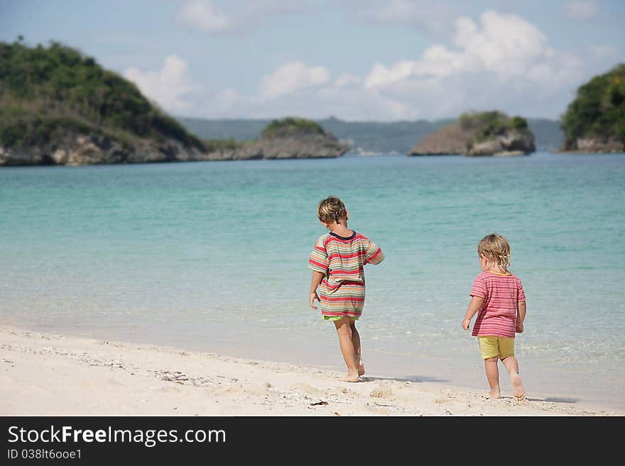 Two children playing on beach. Two children playing on beach