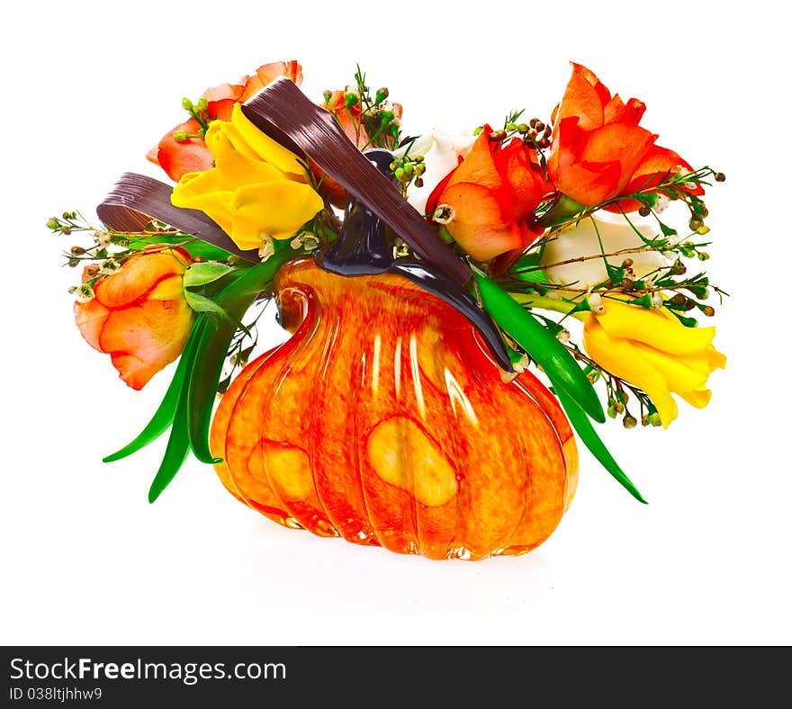 Orange roses in the vase isolated over white background