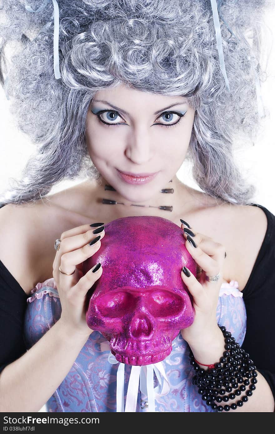 Goth woman in a wig with a skull