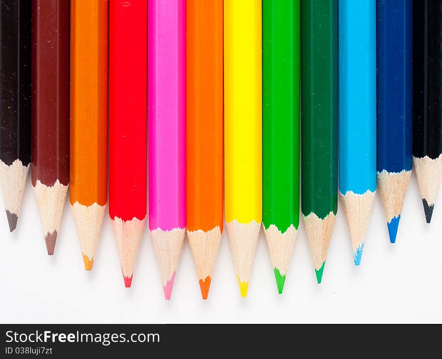 Varicolored color pencils set on white