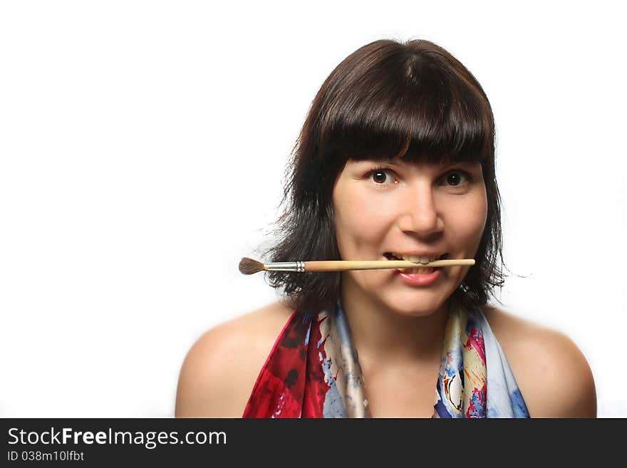 Beautiful Smiling Girl Biting A Brush.