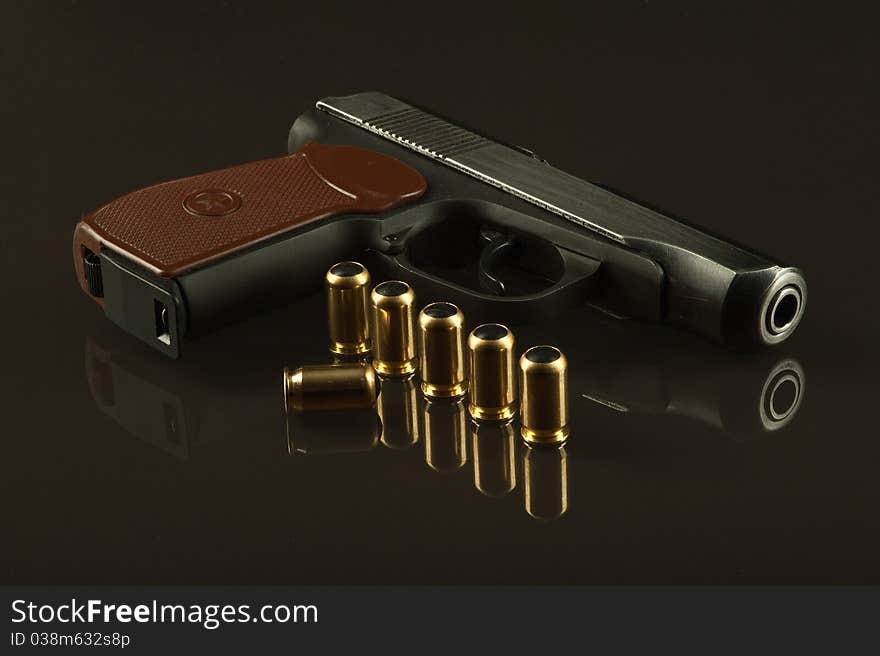 A Gun With Ammunition