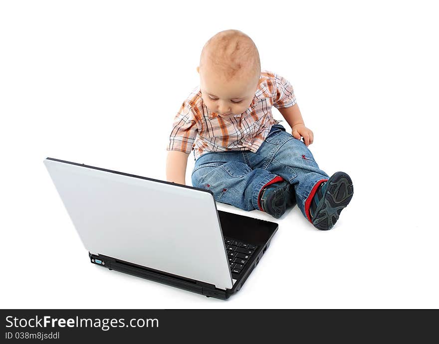 Baby boy using laptop on white background. Baby boy using laptop on white background