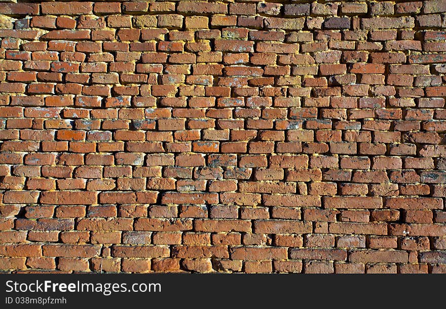 Pattern of an old rusty brick red wall. Pattern of an old rusty brick red wall.