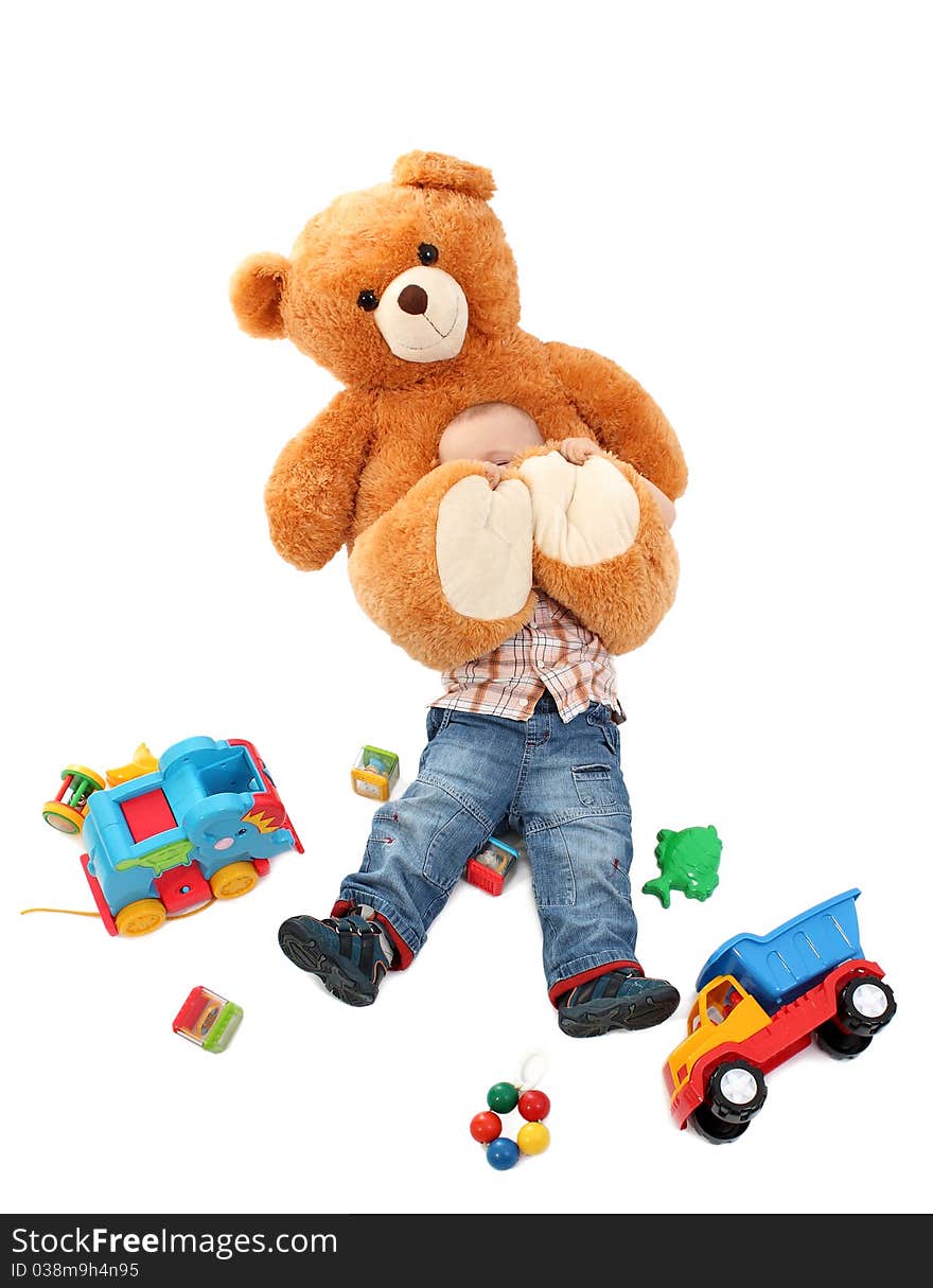 Happy baby boy with toys on white background. Happy baby boy with toys on white background