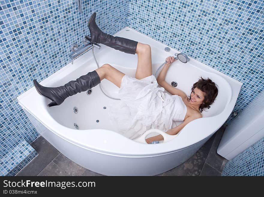 Woman bathing in stylish shoes. Woman bathing in stylish shoes