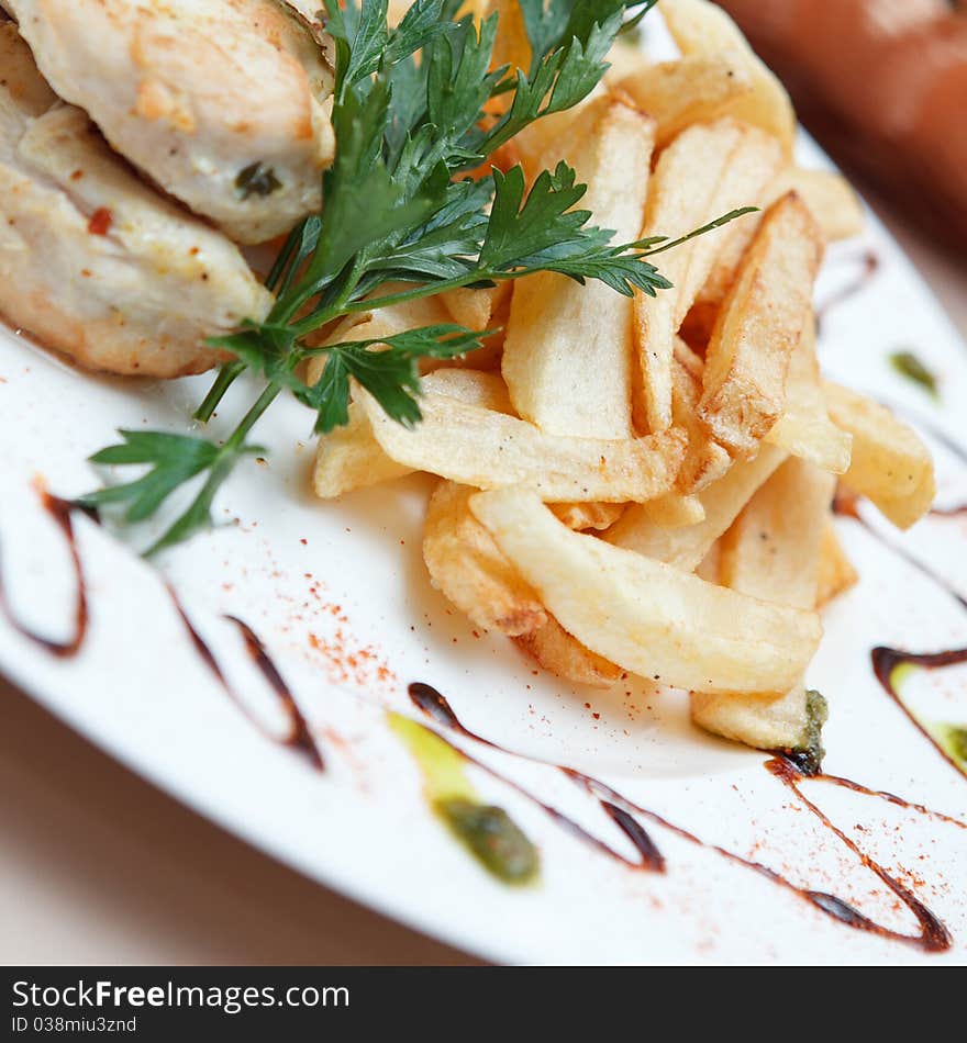 French fries and fried chicken breast